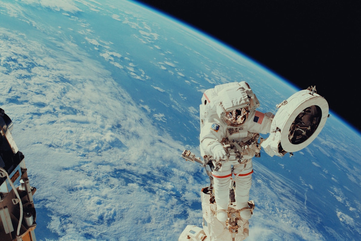 Astronaut on a spacewalk above Earth